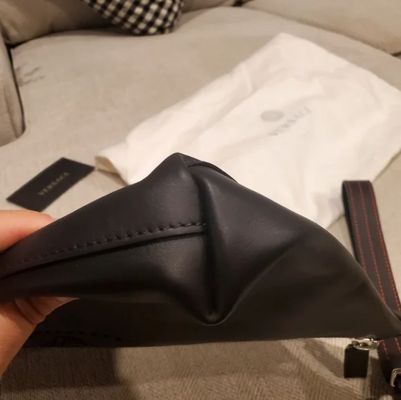 Brand new Versace leather clutch wrislet